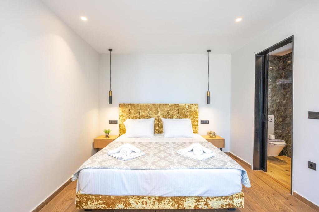 Postel nebo postele na pokoji v ubytování Nobile Hotel
