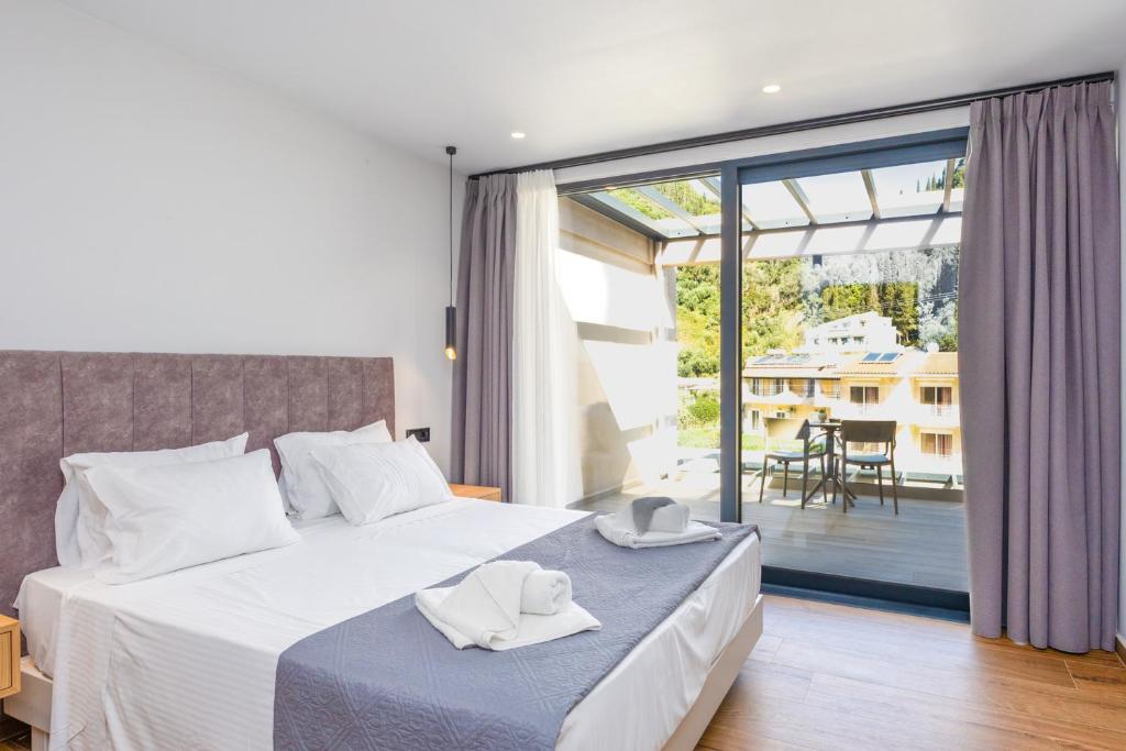 Postel nebo postele na pokoji v ubytování Nobile Hotel