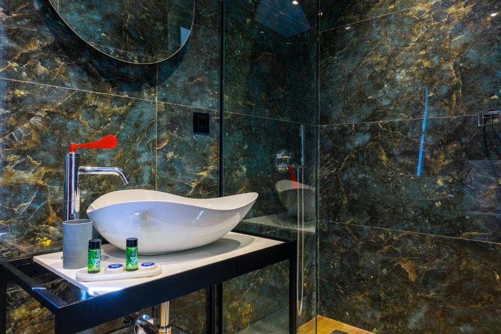 Koupelna v ubytování Nobile Hotel