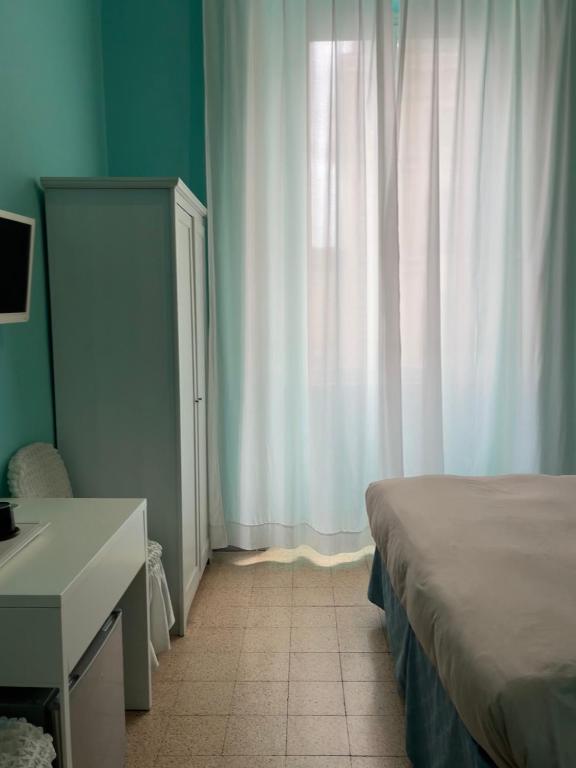 Posteľ alebo postele v izbe v ubytovaní Guest House Meret