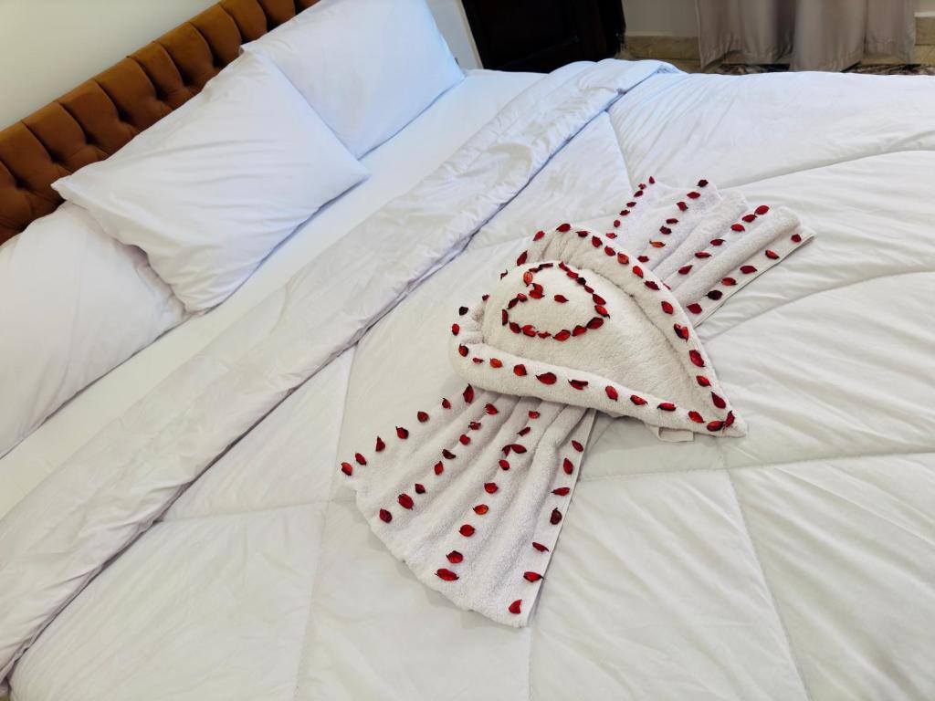 Postel nebo postele na pokoji v ubytování King hur pyramids inn