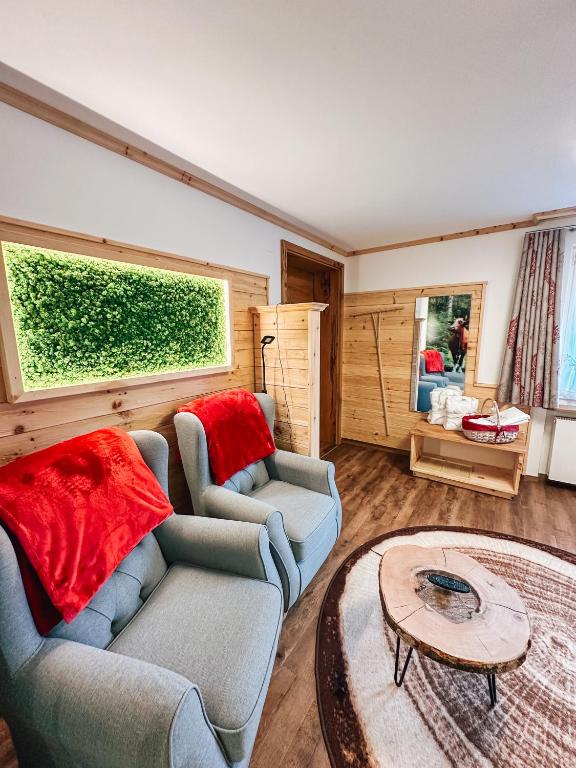 Posezení v ubytování Hotel Schwarzwald-Resort Rößle