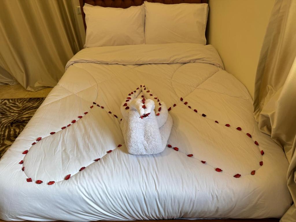 Postel nebo postele na pokoji v ubytování King hur pyramids inn