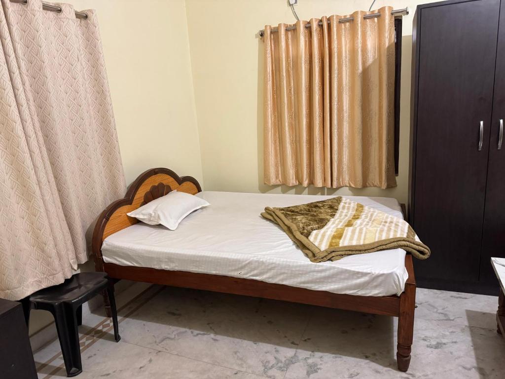 Postel nebo postele na pokoji v ubytování Hotel Manokamna