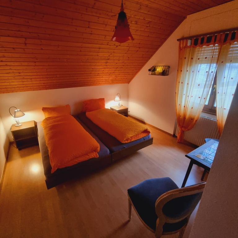 Postel nebo postele na pokoji v ubytování La Légende