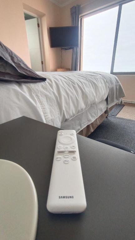 Postel nebo postele na pokoji v ubytování Hostal Florida Valpo