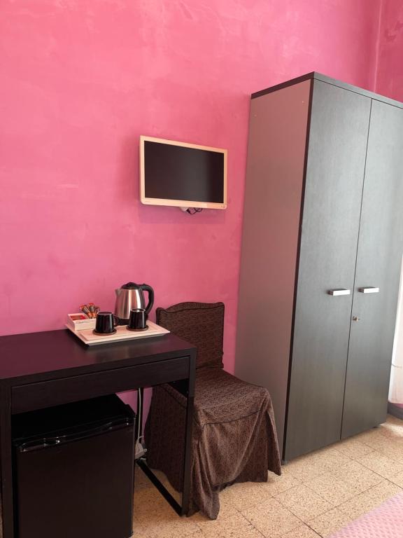 Televízia a/alebo spoločenská miestnosť v ubytovaní Guest House Meret