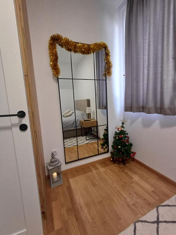 Postel nebo postele na pokoji v ubytování Apartman Nina Divcinova
