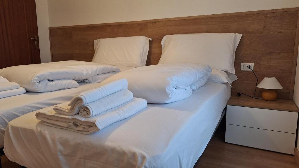 Postel nebo postele na pokoji v ubytování Dolomiti Rock