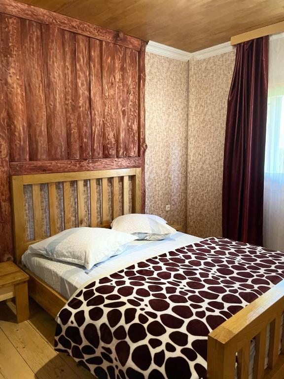 Postel nebo postele na pokoji v ubytování Guest House Shuan
