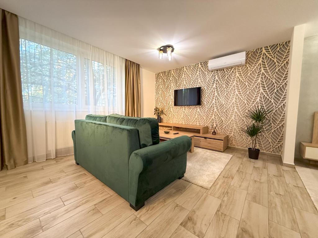 TV a/nebo společenská místnost v ubytování Viola Apartman