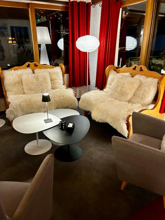 Posezení v ubytování Hotel Bel'alpe