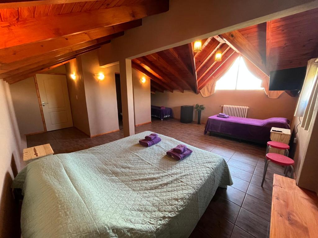 Ένα ή περισσότερα κρεβάτια σε δωμάτιο στο Hotel Koi Mahik