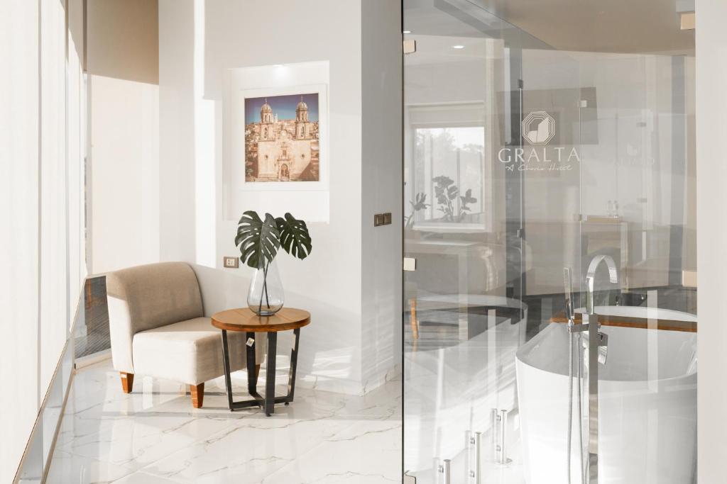 Koupelna v ubytování Hotel GRALTA