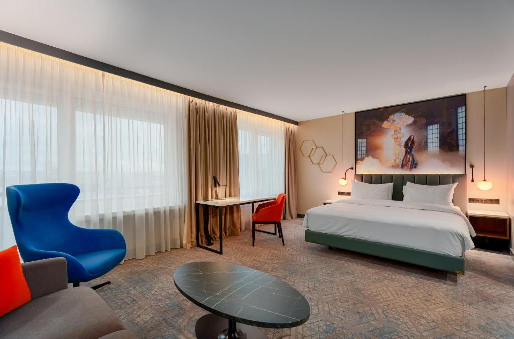 Letto o letti in una camera di Radisson Blu Hotel & Spa, Daugava Riga