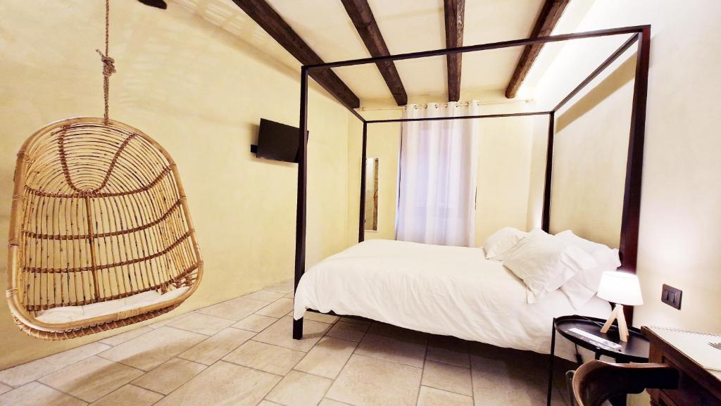 Postel nebo postele na pokoji v ubytování CASA OCRA