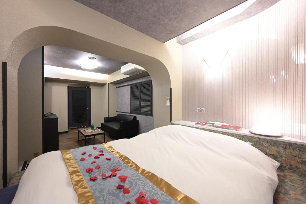 Postel nebo postele na pokoji v ubytování Hotel NEO
