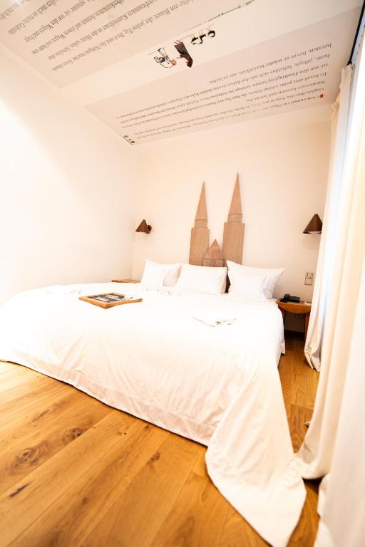 Postel nebo postele na pokoji v ubytování Hotel Drei Raben