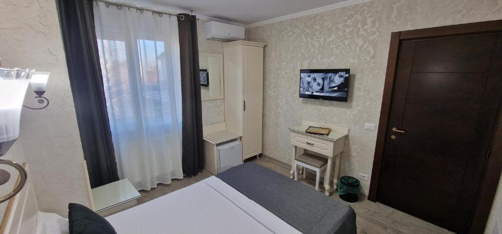 TV a/nebo společenská místnost v ubytování Florian Rooms
