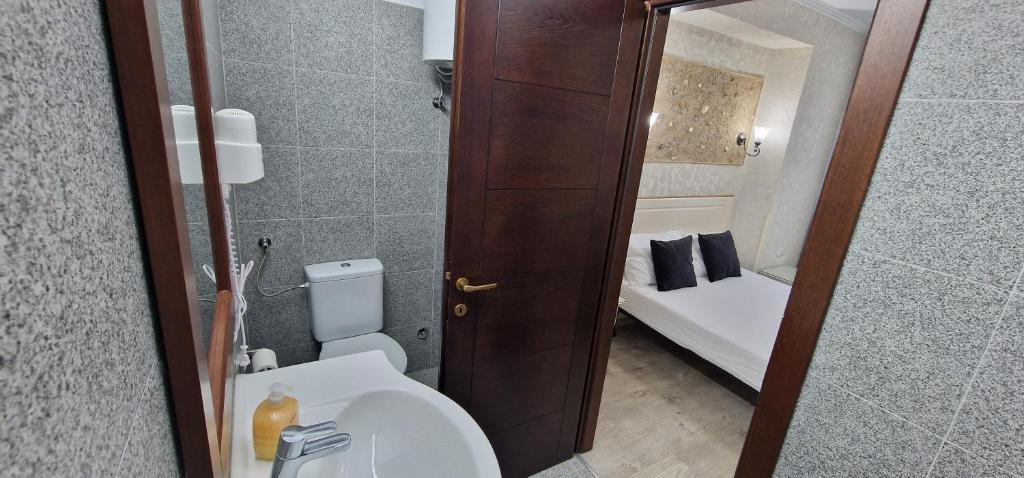 Koupelna v ubytování Florian Rooms