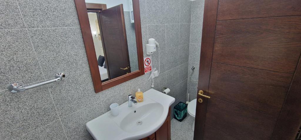 Koupelna v ubytování Florian Rooms