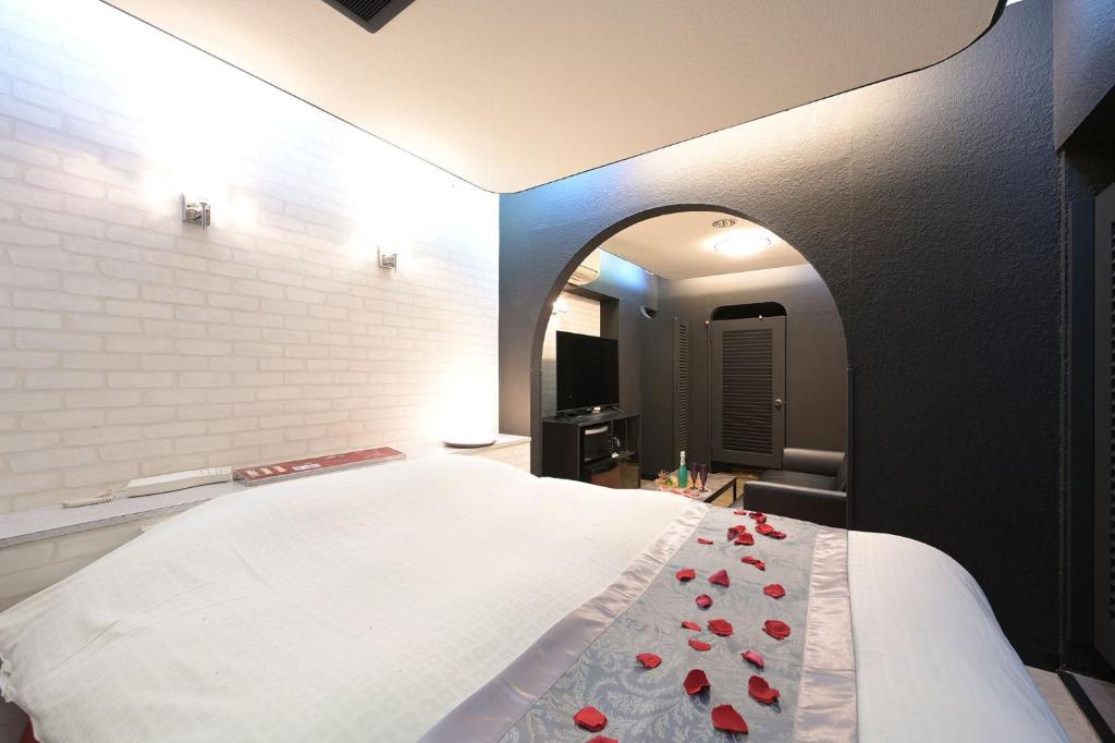 Postel nebo postele na pokoji v ubytování Hotel NEO