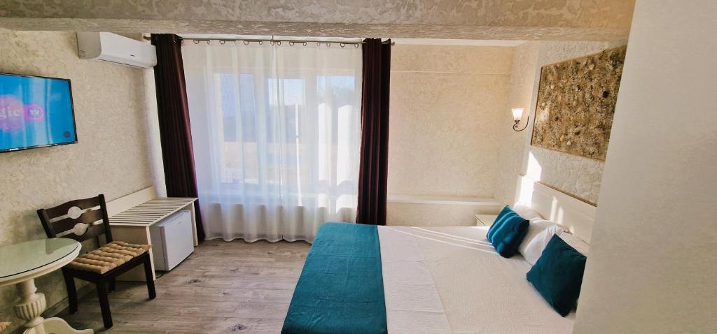 Postel nebo postele na pokoji v ubytování Florian Rooms
