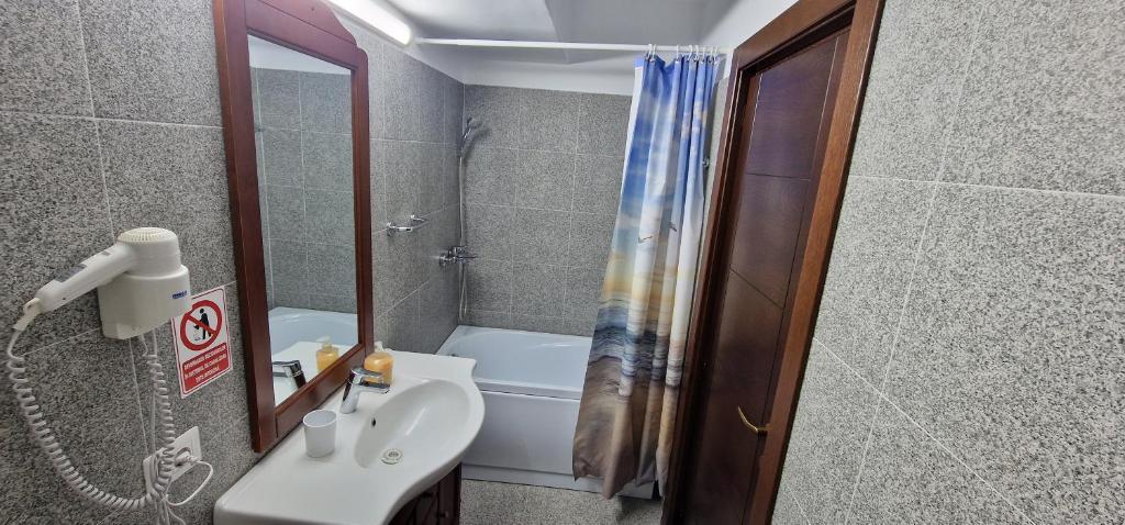 Koupelna v ubytování Florian Rooms