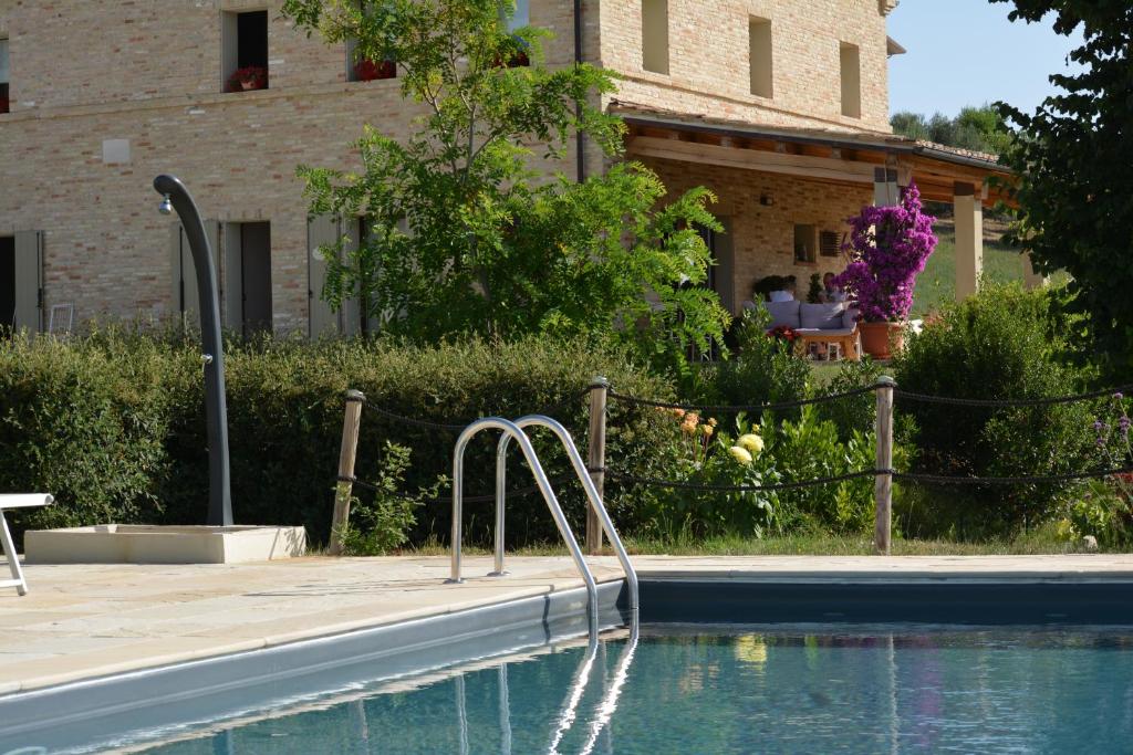 The swimming pool at or close to Casale dei Cinque Colli