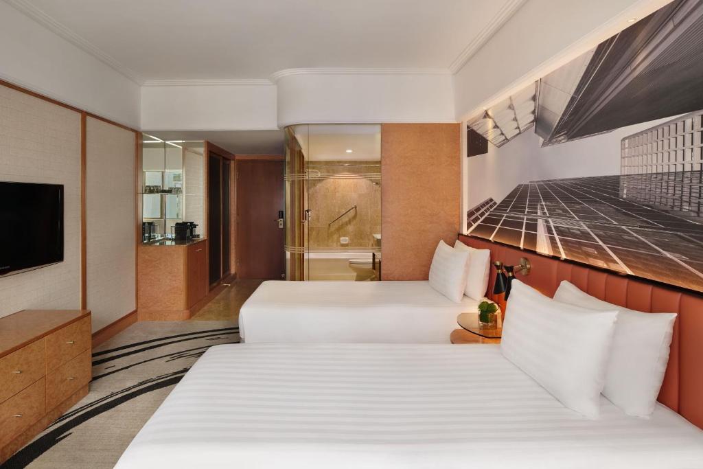 Letto o letti in una camera di The Park Lane Hong Kong, Autograph Collection