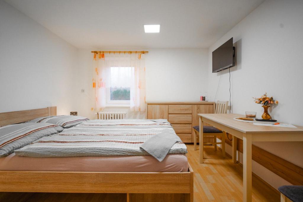 Postel nebo postele na pokoji v ubytování Penzion Mona