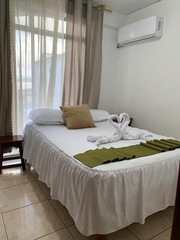 Postel nebo postele na pokoji v ubytování HOTEL PAL-MAR