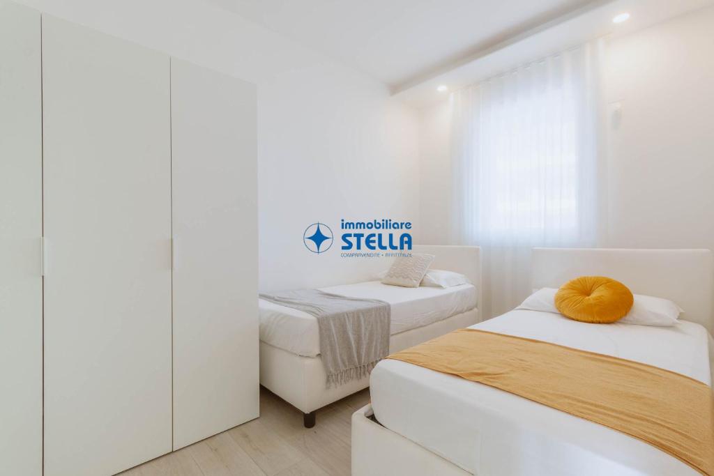 Postel nebo postele na pokoji v ubytování Cala Blu