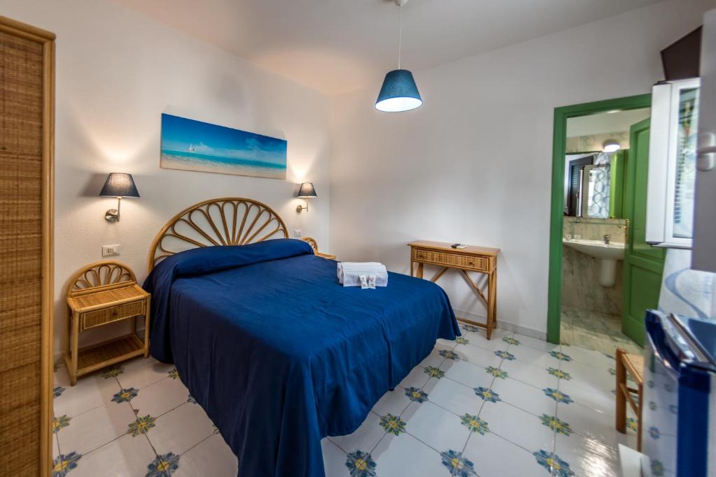 Postel nebo postele na pokoji v ubytování Ischia Dream Sunset