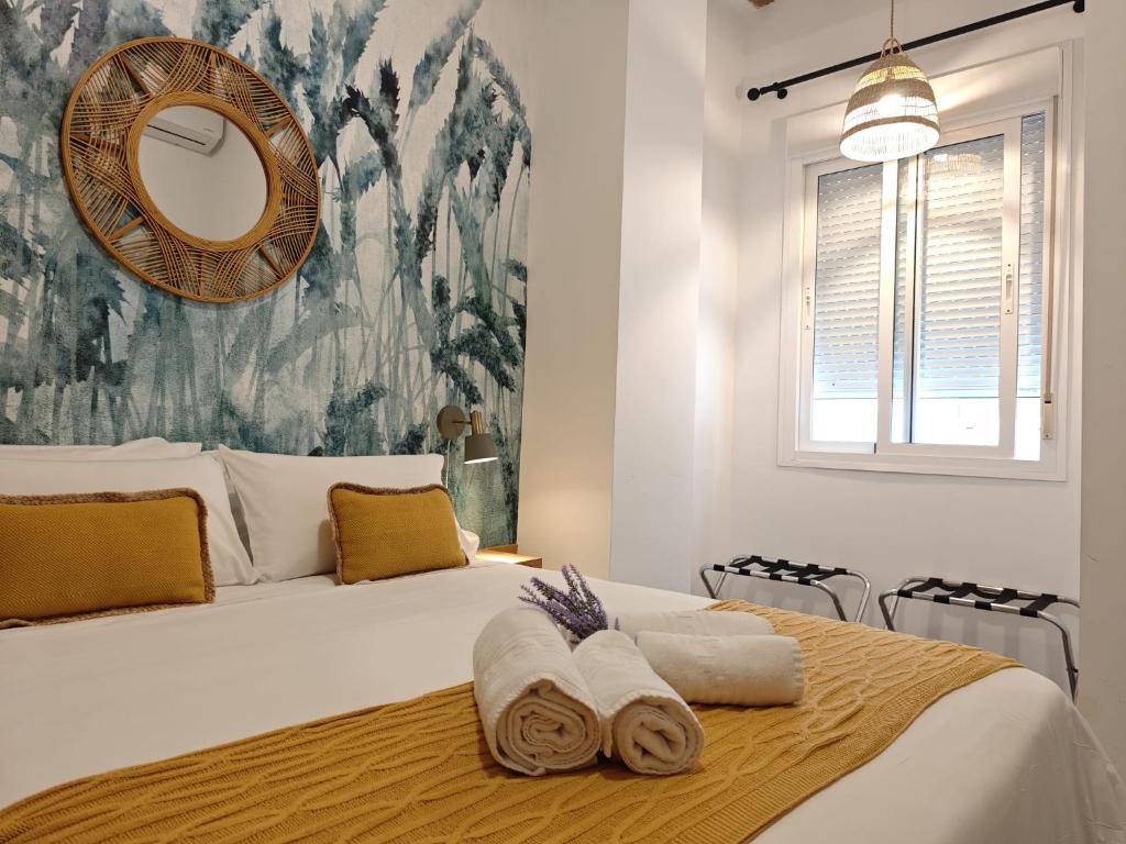 Postel nebo postele na pokoji v ubytování Apartamento del Mercado Little Apartments