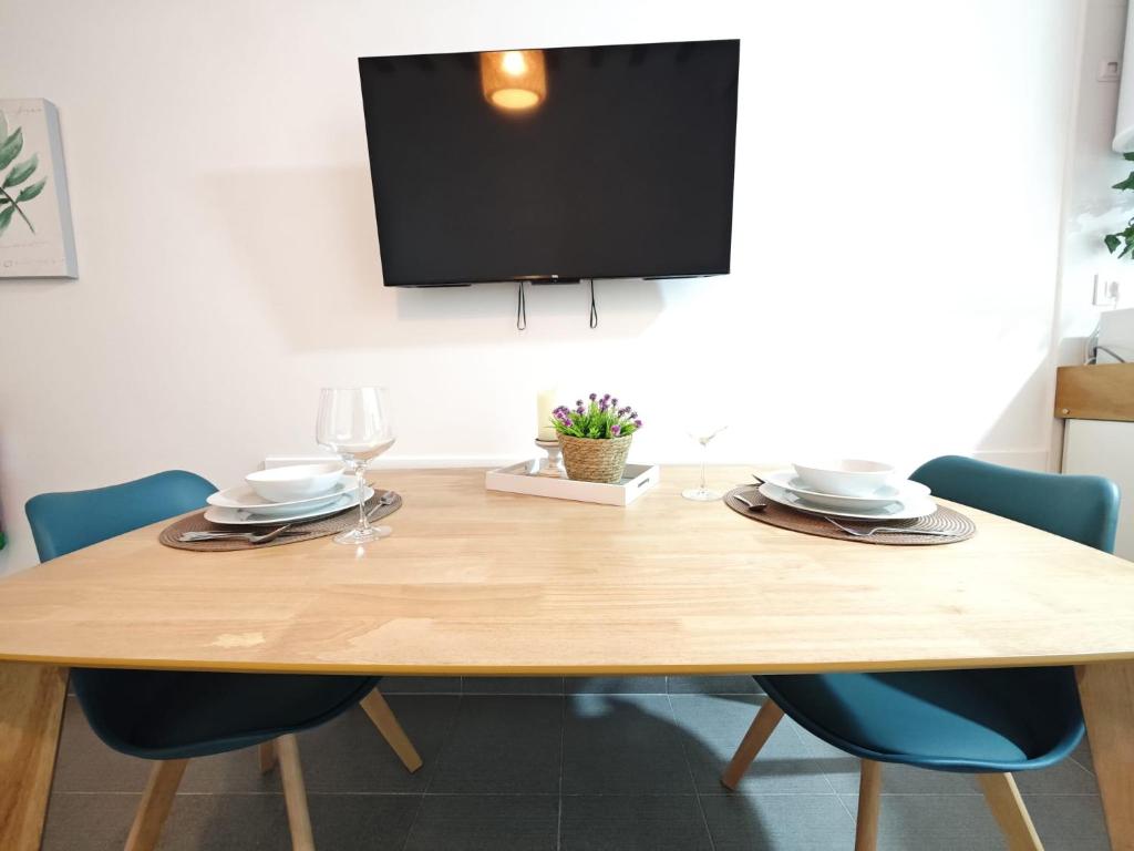 TV a/nebo společenská místnost v ubytování Apartamento del Mercado Little Apartments