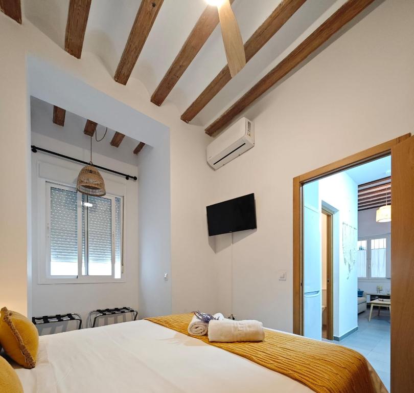 Postel nebo postele na pokoji v ubytování Apartamento del Mercado Little Apartments