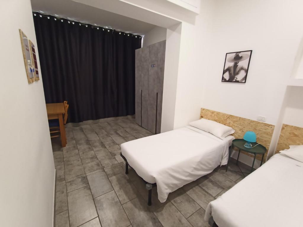 Airport Boulevard Guesthouse - Habitación Doble Con Baño Privado Externo
