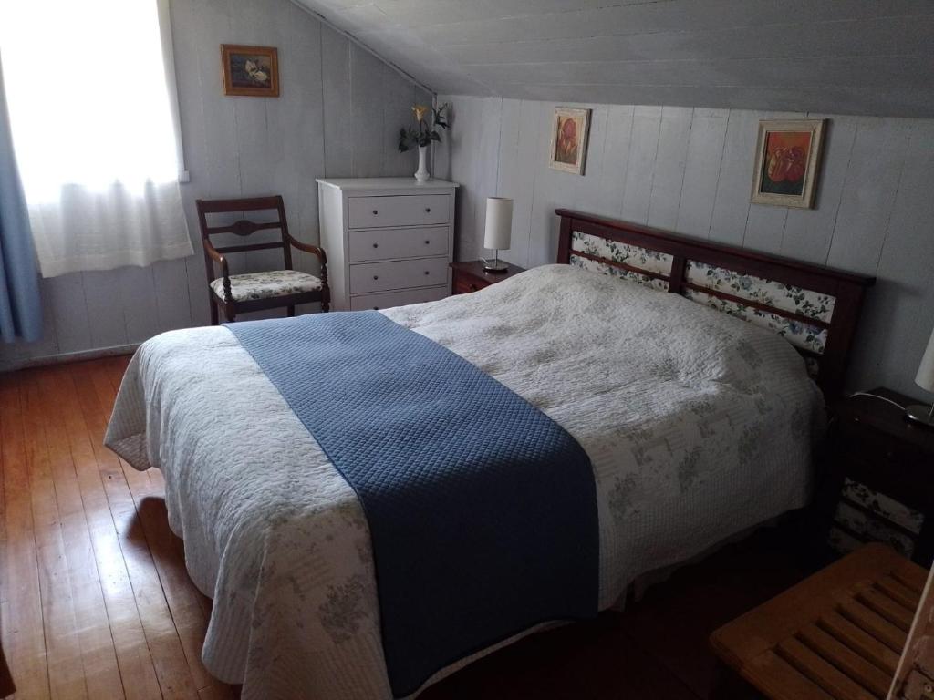 Uma cama ou camas num quarto em La Posada del Colono
