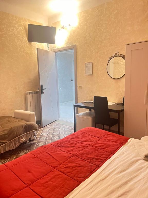 Postel nebo postele na pokoji v ubytování Infinity Passion