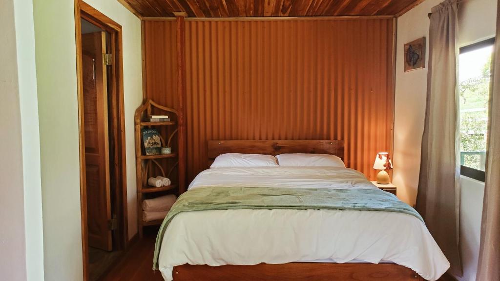 Postel nebo postele na pokoji v ubytování Grand Luna - Monteverde