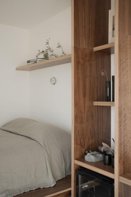 Postel nebo postele na pokoji v ubytování RESET Hotel Joshua Tree