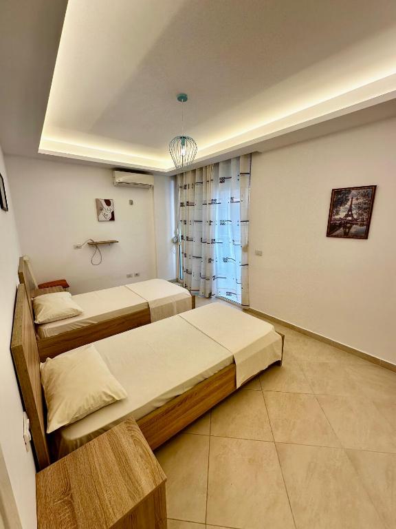 Postel nebo postele na pokoji v ubytování Villa Arberia
