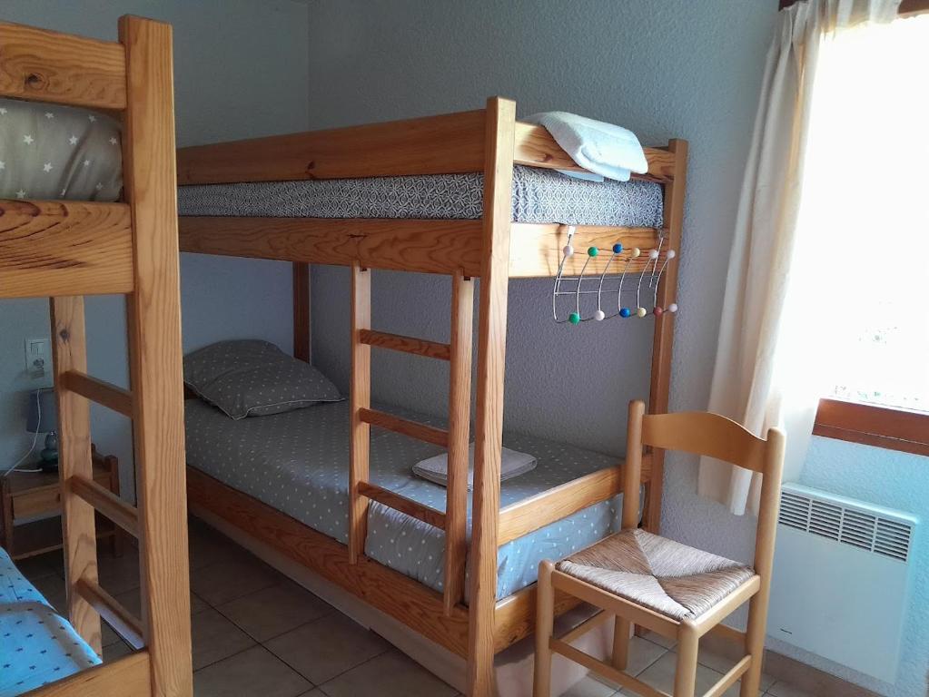 Palanda nebo palandy na pokoji v ubytování Evasion en pays Cathare