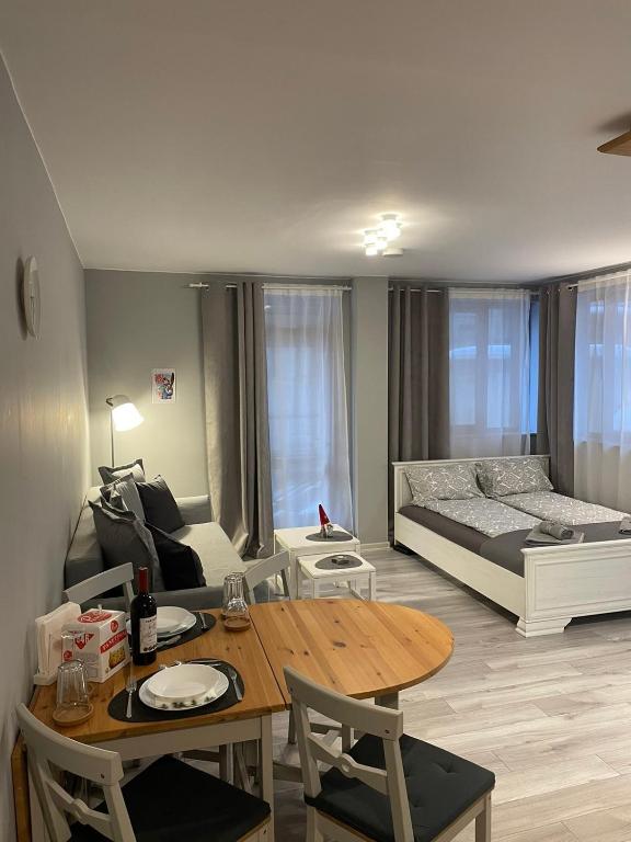 Postel nebo postele na pokoji v ubytování Castle Studio 203
