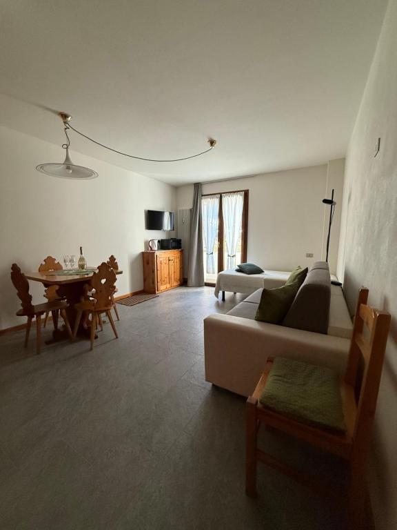 A bed or beds in a room at Appartamento Marco