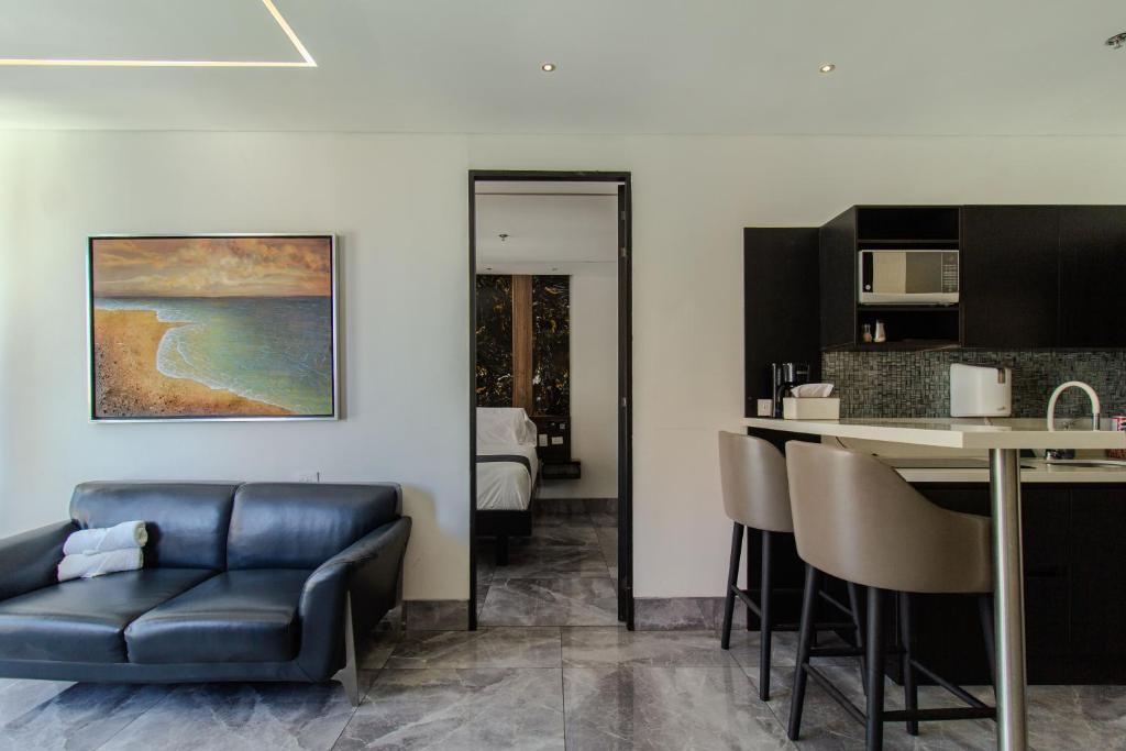 Kuchyň nebo kuchyňský kout v ubytování Haven A Design Hotel