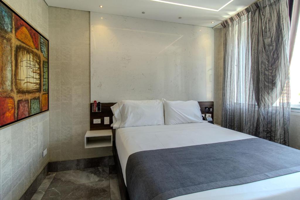 Postel nebo postele na pokoji v ubytování Haven A Design Hotel