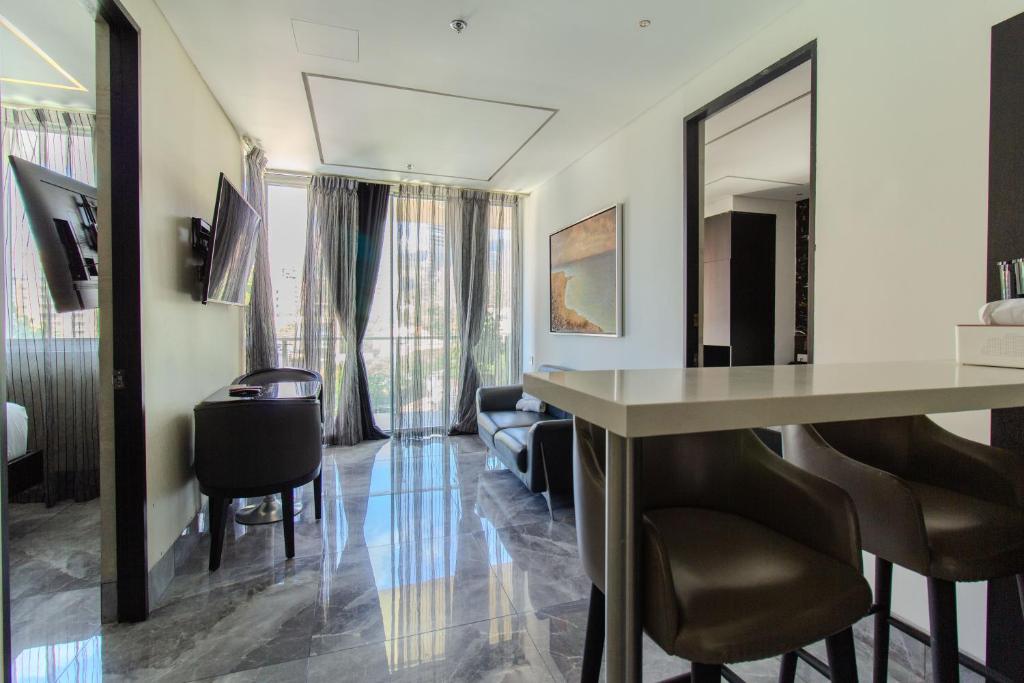 TV a/nebo společenská místnost v ubytování Haven A Design Hotel