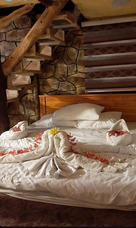 Postel nebo postele na pokoji v ubytování Dana Gate Lodge